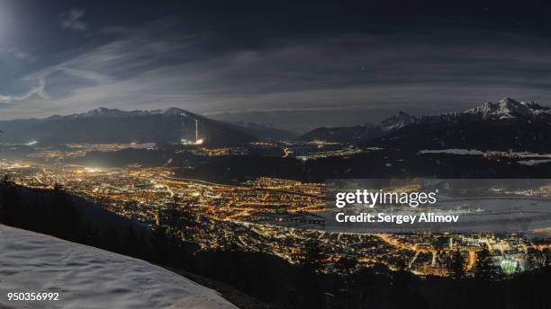 aerial view of innsbruck at night - austria skyline stock pictures, royalty-free photos & images