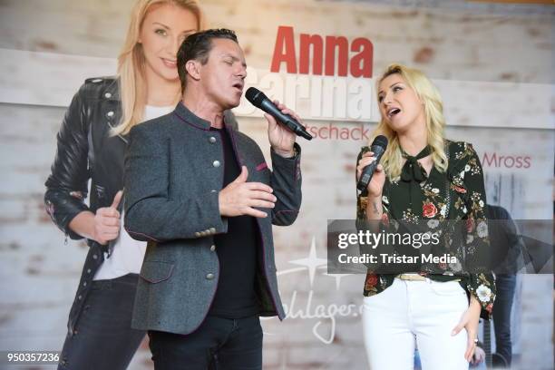 Anna-Carina Woitschack and her boyfriend Stefan Mross promote their new album 'Liebe passiert' at Lausitz Park shopping mall on April 23, 2018 in...