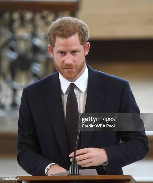 Prince Harry speaks during a memorial service at St Martin-in-the-Fields in Trafalgar Square to commemorate the 25th anniversary of the murder of...