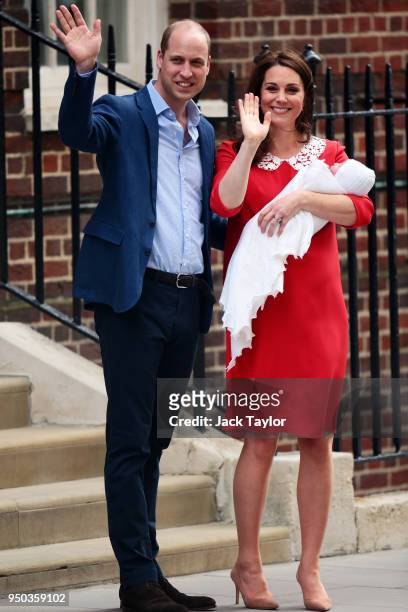 Prince William, Duke of Cambridge and Catherine, Duchess of Cambridge, pose for photographers with their newborn baby boy Prince Louis of Cambridge...