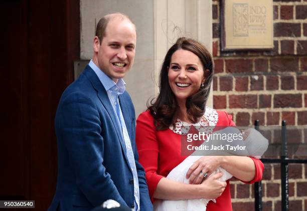 Prince William, Duke of Cambridge and Catherine, Duchess of Cambridge, pose for photographers with their newborn baby boy Prince Louis of Cambridge...