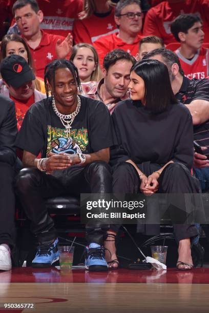 Travis Scott and Kylie Jenner attend Game Two of Round One between the Minnesota Timberwolves and the Houston Rockets during the 2018 NBA Playoffs on...