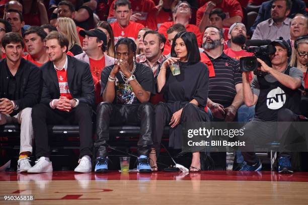 Travis Scott and Kylie Jenner attend Game Two of Round One between the Minnesota Timberwolves and the Houston Rockets during the 2018 NBA Playoffs on...