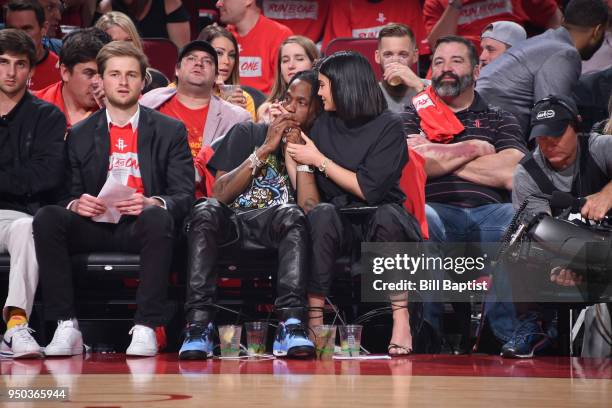 Travis Scott and Kylie Jenner attend Game Two of Round One between the Minnesota Timberwolves and the Houston Rockets during the 2018 NBA Playoffs on...