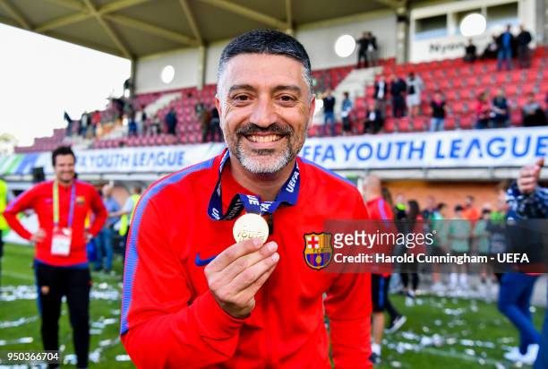 Barcelona coach Francisco Pimienta celebrates following the UEFA Youth League Final between Chelsea FC and FC Barcelona at Colovray Sports Centre on...