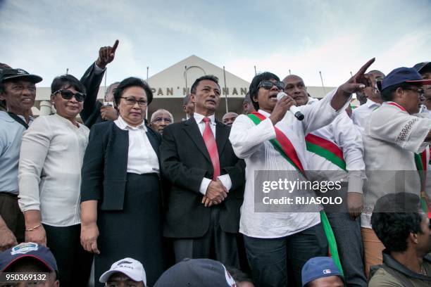 Former President of Madagascar Marc Ravalomanana and his wife Mayor of Antananarivo Lalao Ravalomanana look on as opposition supporters and deputies...