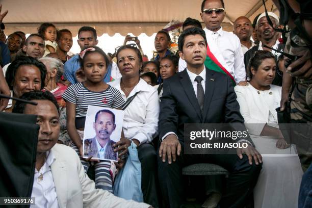 Former President of the Transition Andry Rajoelina offers his condolences to the families of victims at "May 13 Square" in Antananarivo on April 23...
