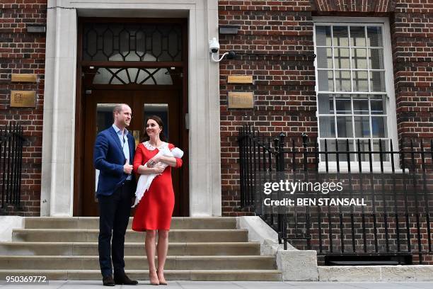 Britain's Prince William, Duke of Cambridge and Britain's Catherine, Duchess of Cambridge aka Kate Middleton show their newly-born son, their third...