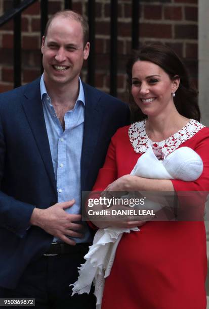 Britain's Prince William, Duke of Cambridge and Britain's Catherine, Duchess of Cambridge aka Kate Middleton show their newly-born son, their third...