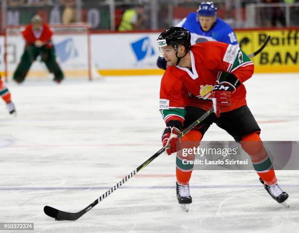 Christopher Bodo of Hungary controls the puck during the 2018 IIHF Ice Hockey World Championship Division I Group A match between Hungary and...