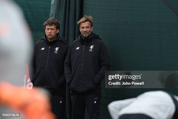 Jurgen Klopp and Peter Krawietz of Liverpool during a training session at Melwood Training Ground on April 23, 2018 in Liverpool, England.