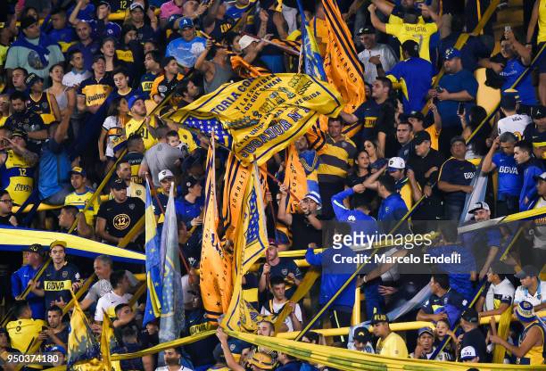 Fans of Boca Juniors cheer for their team during a match between Boca Juniors and Newell's Old Boys as part of Argentine Superliga 2017/18 at Alberto...