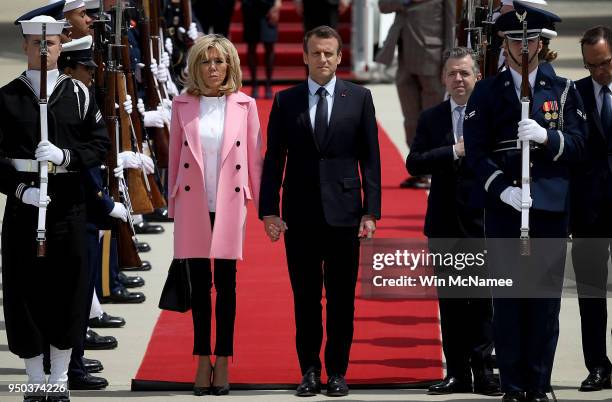 French President Emmanuel Macron and his wife Brigitte arrive at Andrews Air Force Base April 23, 2018 at Joint Base Andrews, Maryland. Macron is in...