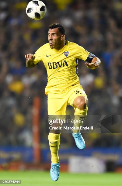 Carlos Tevez of Boca Juniors heads the ball during a match between Boca Juniors and Newell's Old Boys as part of Argentine Superliga 2017/18 at...