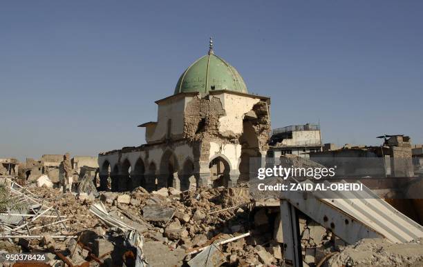 View of the destroyed al-Nuri mosque in the old city of Mosul is seen on April 23, 2018. The United Arab Emirates and Iraq launched a joint effort to...