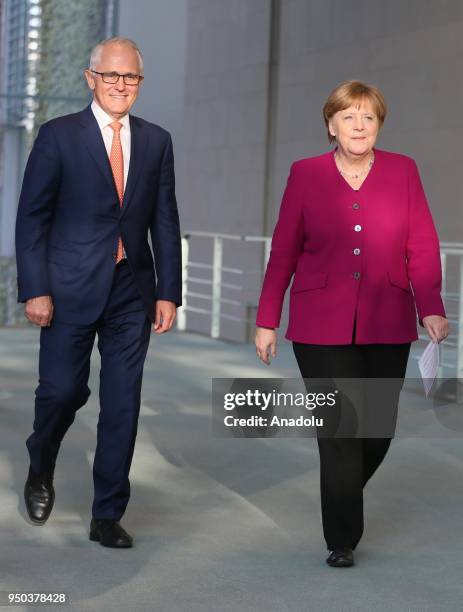 German Chancellor Angela Merkel and Australian Prime Minister Malcolm Turnbull arrive for the joint press conference ahead of their meeting at the...