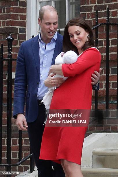 Britain's Prince William, Duke of Cambridge and Britain's Catherine, Duchess of Cambridge aka Kate Middleton show their newly-born son, their third...