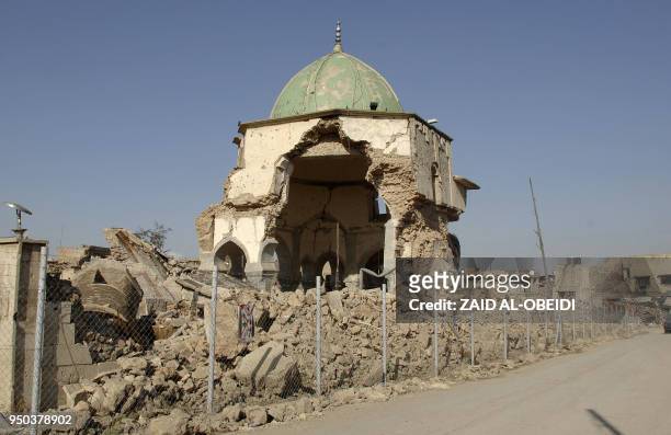 View of the destroyed al-Nuri mosque is seen in the old city of Mosul in northern Iraq on April 23, 2018. The United Arab Emirates and Iraq launched...