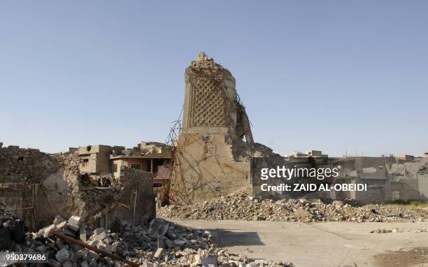 View of the destroyed leaning minaret , dubbed "the hunchback", or Al-Habda, at the al-Nuri mosque is seen in the old city of Mosul in northern Iraq...