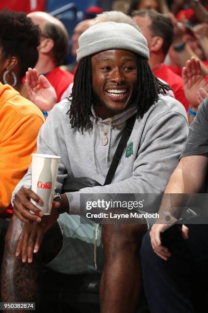 Alvin Kamara attends Game Three of Round One between the Portland Trail Blazers and the New Orleans Pelicans during the 2018 NBA Playoffs on April...