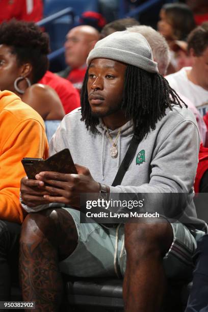 Alvin Kamara attends Game Three of Round One between the Portland Trail Blazers and the New Orleans Pelicans during the 2018 NBA Playoffs on April...