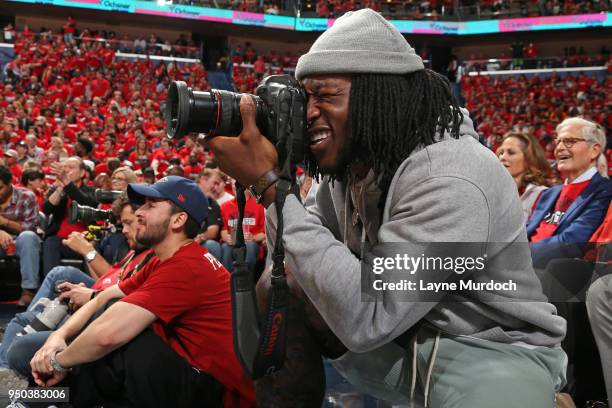 Alvin Kamara attends Game Three of Round One between the Portland Trail Blazers and the New Orleans Pelicans during the 2018 NBA Playoffs on April...