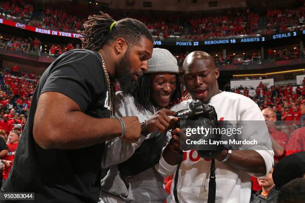 New Orleans Saints players Cameron Jordan, Alvin Kamara, and Chris Banjo attend Game Three of Round One between the Portland Trail Blazers and the...