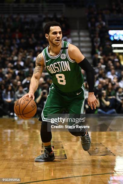 Shane Larkin of the Boston Celtics handles the ball against the Milwaukee Bucks during game three of round one of the Eastern Conference playoffs at...