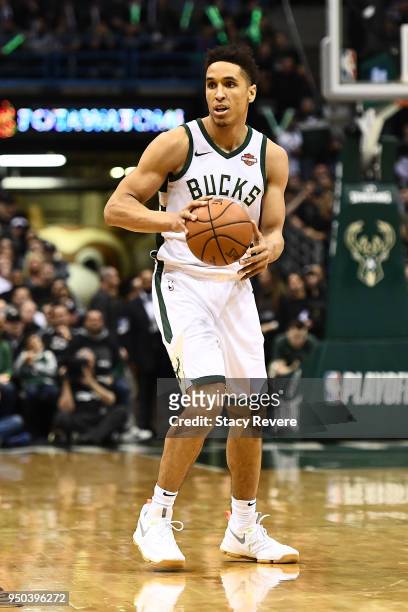 Malcolm Brogdon of the Milwaukee Bucks handles the ball against the Boston Celtics during game three of round one of the Eastern Conference playoffs...