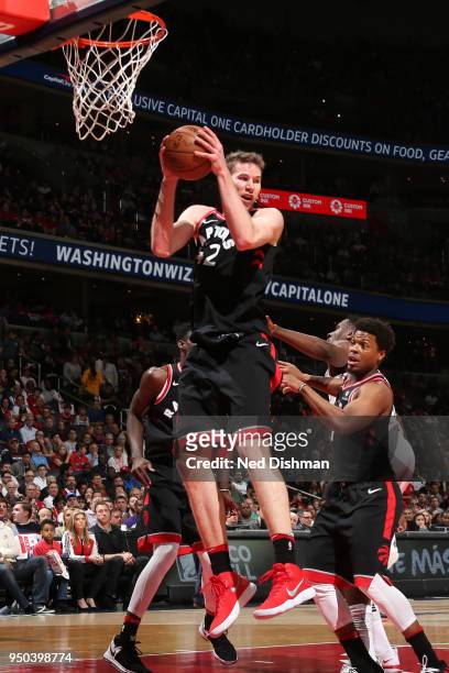 Jakob Poeltl of the Toronto Raptors grabs the rebound against the Washington Wizards in Game Four of Round One of the 2018 NBA Playoffs on April 22,...