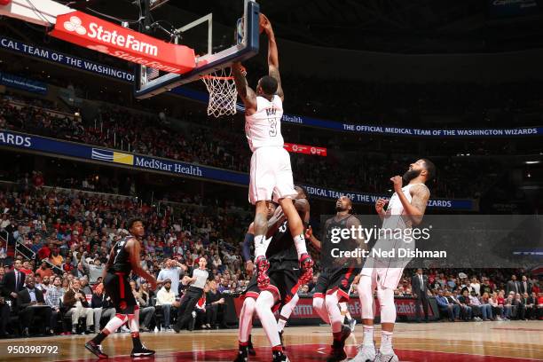 Bradley Beal of the Washington Wizards dunks the ball against the Toronto Raptors in Game Four of Round One of the 2018 NBA Playoffs on April 22,...