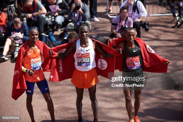 Eliud Kipchoge KEN winner of the Elite Mens Race with Tola Shura Kitata ETH and Mo Farah GBR . The Virgin Money London Marathon, 22 April 2018.