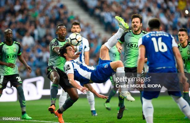 Porto's Spanish defender Ivan Marcano kicks the ball to score a goal during the Portuguese league football match between FC Porto and Vitoria Setubal...