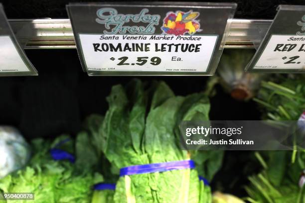 Romaine lettuce is displayed on a shelf at a supermarket on April 23, 2018 in San Rafael, California. The Food and Drug Administration and the...