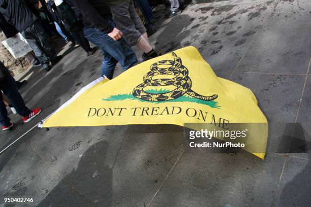 One of the flags used by Dankula's supporters, used often by the Right-wing Tea Party Movement in America in London, on 23 April 2018 to protest Free...