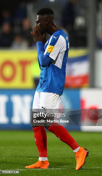 Kingsley Schindler of Kiel looks dejected after a missed chance during the Second Bundesliga match between Holstein Kiel and 1. FC Nuernberg at...