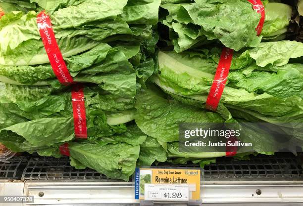 Romaine lettuce is displayed on a shelf at a supermarket on April 23, 2018 in San Rafael, California. The Food and Drug Administration and the...