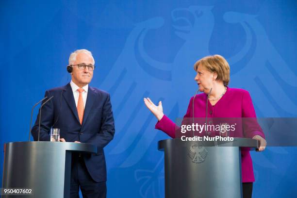 German Chancellor Angela Merkel and Australian Prime Minister Malcolm Turnbull are pictured during a press conference at the Chancellery in Berlin,...