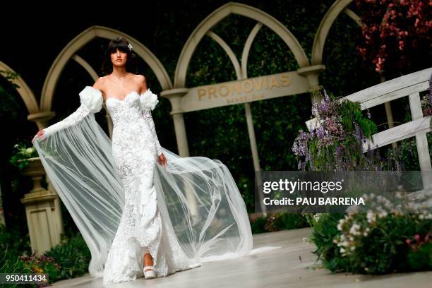 Model presents a creation of the Pronovias 2019 collection during the Barcelona Bridal Week in Barcelona, on April 23, 2018.