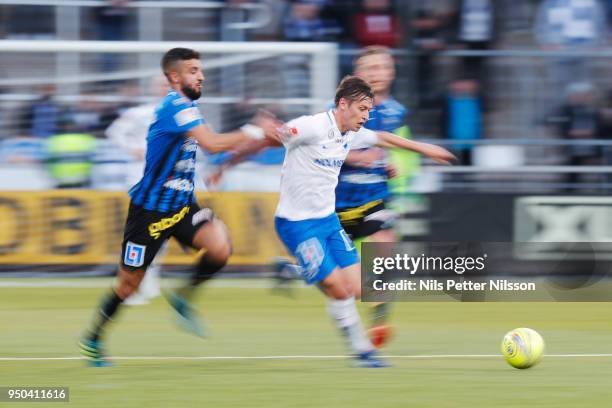 Omar Eddahri of IK Sirius FK and Simon Thern of IFK Norrkoping during the Allsvenskan match between IFK Norrkoping and IK Sirius FK on April 23, 2018...