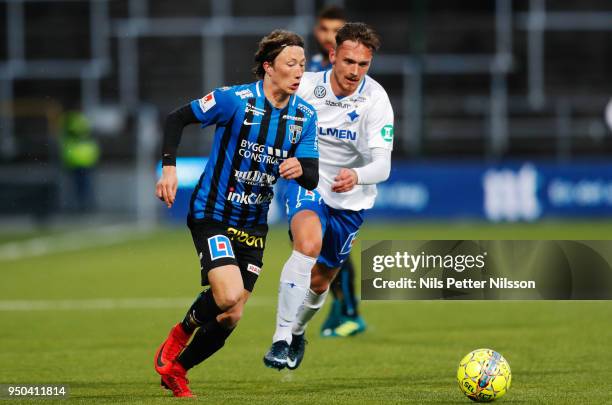 Axel Bjornstrom of IK Sirius FK and Linus Wahlqvist of IFK Norrkoping during the Allsvenskan match between IFK Norrkoping and IK Sirius FK on April...