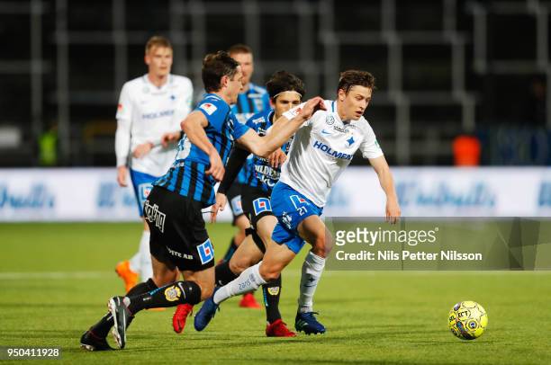 Philip Haglund of IK Sirius FK and Simon Thern of IFK Norrkoping competes for the ball during the Allsvenskan match between IFK Norrkoping and IK...