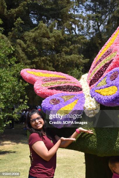 Visitor seen at the flower festival. The Botanical Garden is hosting a flower festival which is decorated with the theme 'Mexico and its Colors' to...