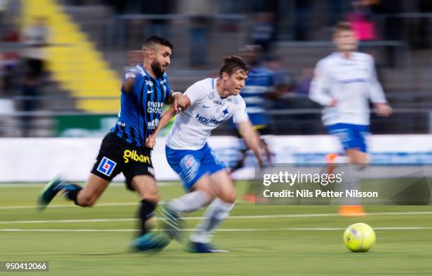 Omar Eddahri of IK Sirius FK and Simon Thern of IFK Norrkoping competes for the ball during the Allsvenskan match between IFK Norrkoping and IK...