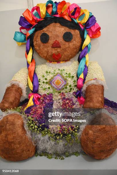 Doll seen made with flower. The Botanical Garden is hosting a flower festival which is decorated with the theme 'Mexico and its Colors' to celebrate...