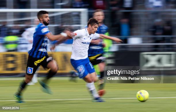 Omar Eddahri of IK Sirius FK and Simon Thern of IFK Norrkoping competes for the ball during the Allsvenskan match between IFK Norrkoping and IK...