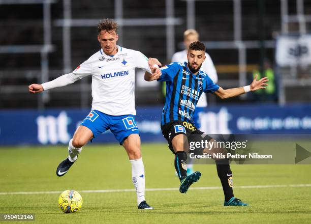 Linus Wahlqvist of IFK Norrkoping and Omar Eddahri of IK Sirius FK competes for the ball during the Allsvenskan match between IFK Norrkoping and IK...