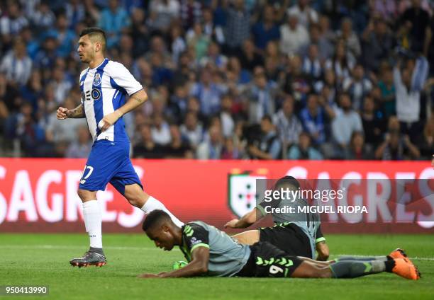 Porto's Mexican forward Jesus Corona runs after scoring a goal during the Portuguese league football match between FC Porto and Vitoria Setubal at...
