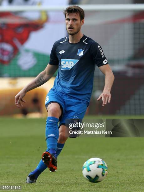 Havard Nordtveit of Hoffenheim runs with the ball during the Bundesliga match between RB Leipzig and TSG 1899 Hoffenheim at Red Bull Arena on April...