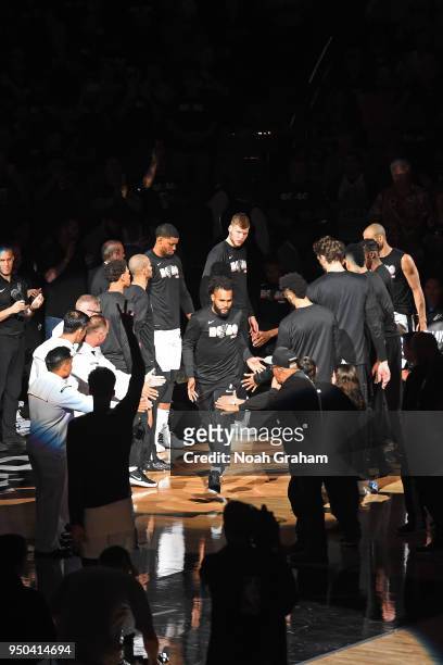 Patty Mills of the San Antonio Spurs is introduced before the game against the Golden State Warriors in Game Three of Round One of the 2018 NBA...